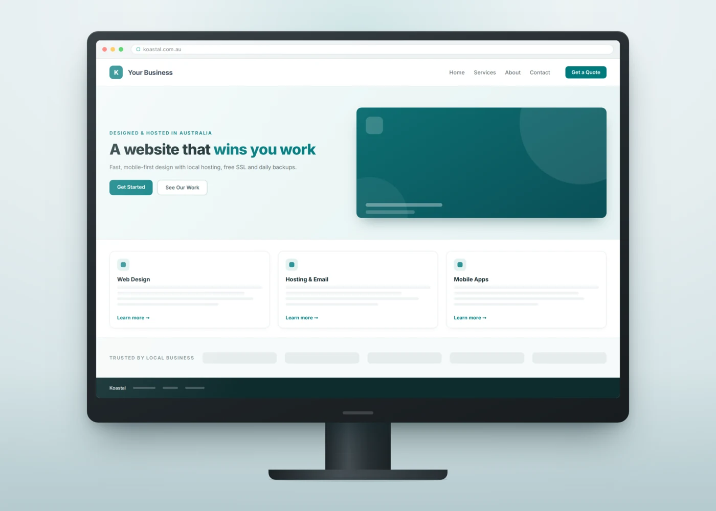 Desktop monitor displaying a modern small-business website with a hero section, service cards and a call-to-action button Desktop monitor displaying a modern small-business website with a hero section, service cards and a call-to-action button